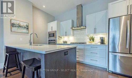 100 - 1705 Fiddlehead Place, London, ON - Indoor Photo Showing Kitchen With Upgraded Kitchen