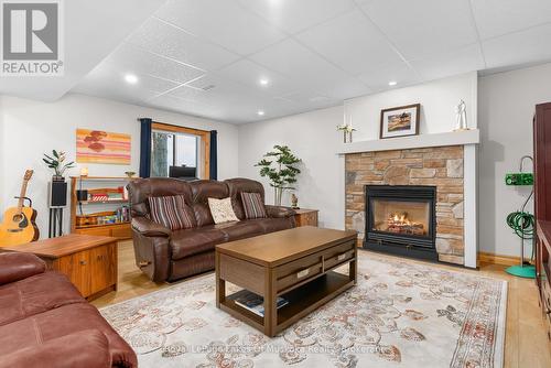 354 Bayshore Boulevard, Huntsville (Chaffey), ON - Indoor Photo Showing Living Room With Fireplace