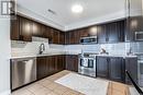 202 - 904 Paisley Road, Guelph (Parkwood Gardens), ON  - Indoor Photo Showing Kitchen With Stainless Steel Kitchen With Upgraded Kitchen 