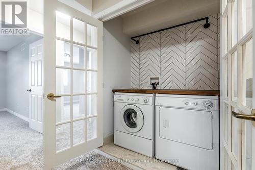 202 - 904 Paisley Road, Guelph (Parkwood Gardens), ON - Indoor Photo Showing Laundry Room