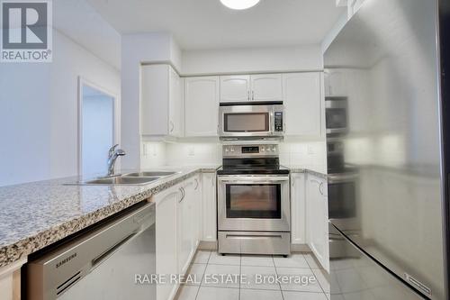 Ph08 - 8 Mckee Avenue, Toronto, ON - Indoor Photo Showing Kitchen With Double Sink