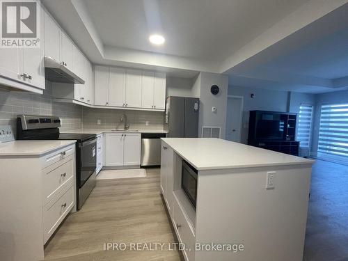 304 - 19B West Street N, Kawartha Lakes, ON - Indoor Photo Showing Kitchen With Stainless Steel Kitchen