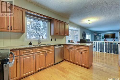 11 Forbes Place, Regina, SK - Indoor Photo Showing Kitchen With Double Sink