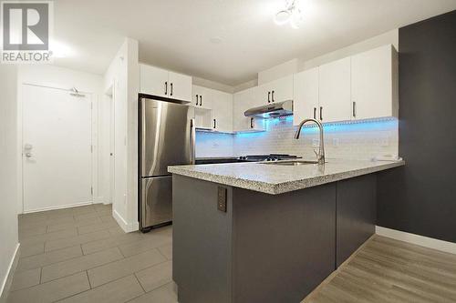 407 8600 Park Road, Richmond, BC - Indoor Photo Showing Kitchen With Stainless Steel Kitchen