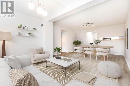 606 - 633 Bay Street, Toronto, ON - Indoor Photo Showing Living Room