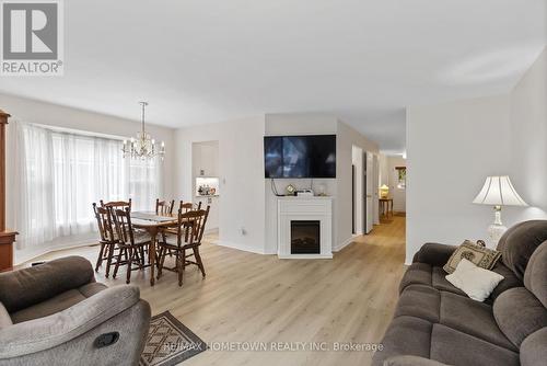 23 Wilmot Young Place, Brockville, ON - Indoor Photo Showing Living Room With Fireplace