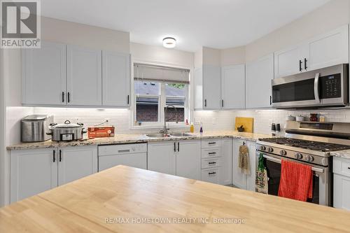 23 Wilmot Young Place, Brockville, ON - Indoor Photo Showing Kitchen With Double Sink