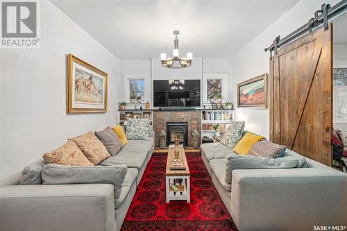 710 University Drive, Saskatoon, SK - Indoor Photo Showing Living Room With Fireplace