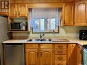 108 3120 Louise Street, Saskatoon, SK  - Indoor Photo Showing Kitchen With Double Sink 