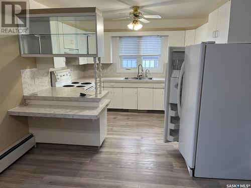 233 6Th Avenue E, Gravelbourg, SK - Indoor Photo Showing Kitchen With Double Sink