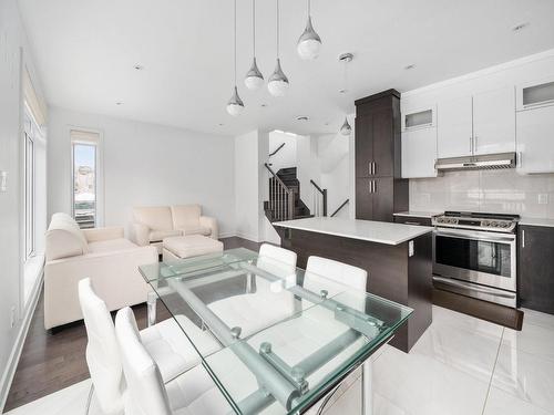 Dining room - 4992Z Rue Lavoie, Montréal (Pierrefonds-Roxboro), QC - Indoor Photo Showing Kitchen With Upgraded Kitchen