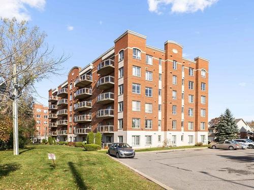 Frontage - 209-5200 Boul. Des Sources, Montréal (Pierrefonds-Roxboro), QC - Outdoor With Balcony With Facade