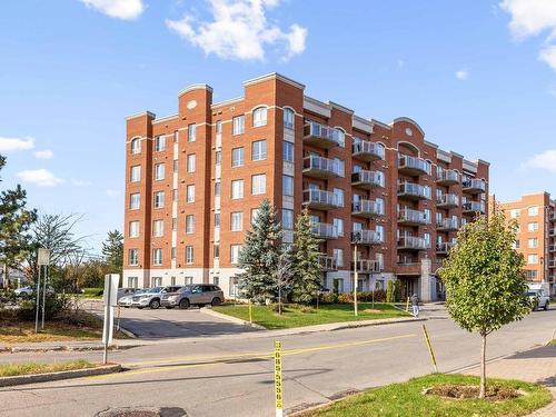 Frontage - 209-5200 Boul. Des Sources, Montréal (Pierrefonds-Roxboro), QC - Outdoor With Balcony With Facade