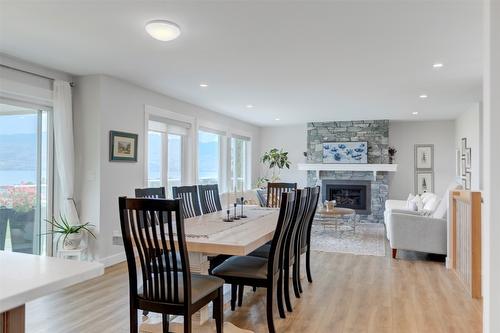 3582 Apple Way Boulevard, West Kelowna, BC - Indoor Photo Showing Dining Room With Fireplace