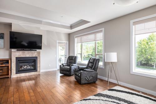 12870 Cliffshore Drive, Lake Country, BC - Indoor Photo Showing Living Room With Fireplace