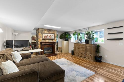 3374 Larkspur Court, Kelowna, BC - Indoor Photo Showing Living Room With Fireplace