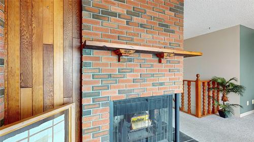 1308 13Th Street, Cranbrook, BC - Indoor Photo Showing Other Room With Fireplace