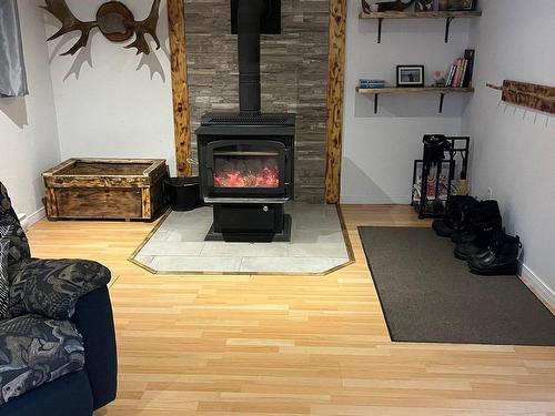 Family room - 10086 Boul. Témiscamingue, Rouyn-Noranda, QC - Indoor With Fireplace