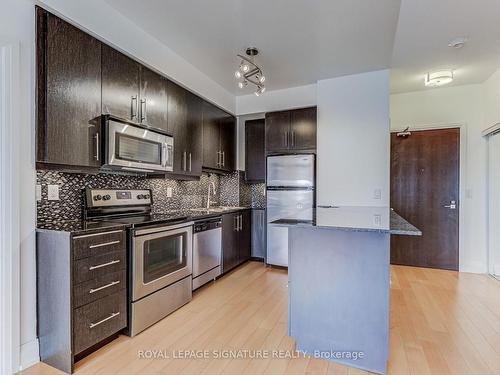 Ph8-1 De Boers Dr, Toronto, ON - Indoor Photo Showing Kitchen With Stainless Steel Kitchen With Upgraded Kitchen