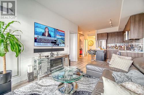 2712 - 30 Shore Breeze Drive, Toronto, ON - Indoor Photo Showing Living Room