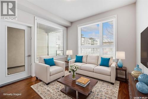 214 225 Maningas Bend, Saskatoon, SK - Indoor Photo Showing Living Room