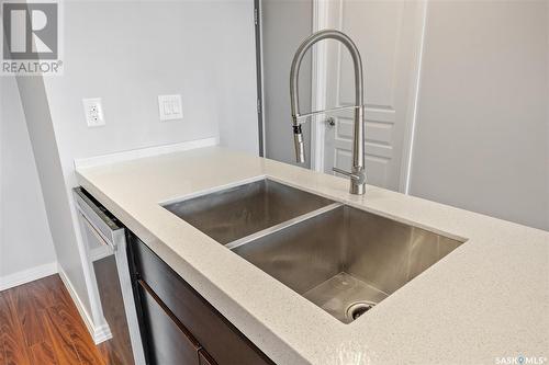 214 225 Maningas Bend, Saskatoon, SK - Indoor Photo Showing Kitchen With Double Sink