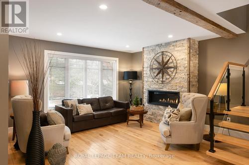 441 Hartleigh Avenue, Ottawa, ON - Indoor Photo Showing Living Room With Fireplace