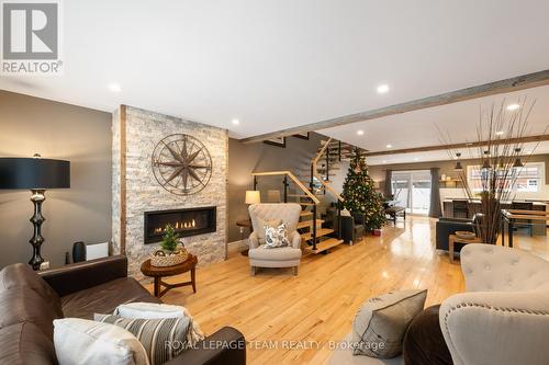 441 Hartleigh Avenue, Ottawa, ON - Indoor Photo Showing Living Room With Fireplace