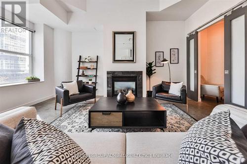 447 - 155 Dalhousie Street, Toronto, ON - Indoor Photo Showing Living Room With Fireplace