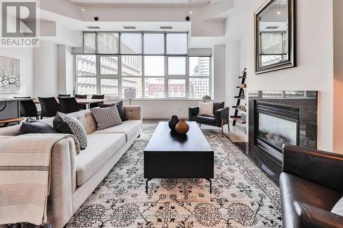 447 - 155 Dalhousie Street, Toronto, ON - Indoor Photo Showing Living Room With Fireplace