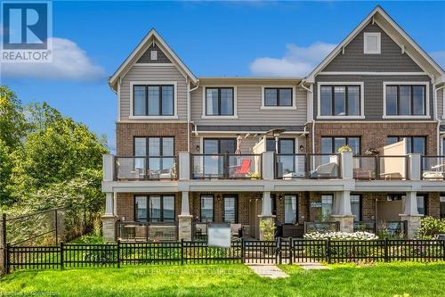 28 Pierre Trudeau Lane, Grimsby, ON - Outdoor With Balcony With Facade