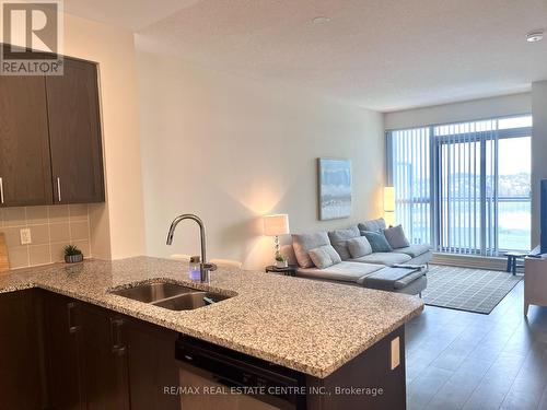 718 - 349 Rathburn Road W, Mississauga, ON - Indoor Photo Showing Kitchen With Double Sink