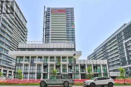 130 - 251 Manitoba Street, Toronto, ON - Outdoor With Facade