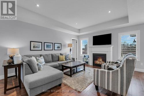 46 Halliday Drive, East Zorra-Tavistock (Tavistock), ON - Indoor Photo Showing Living Room With Fireplace