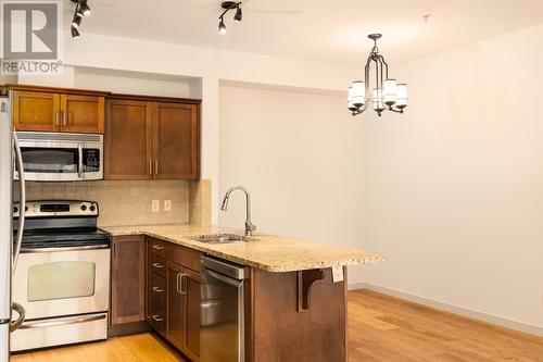 2142 Vasile Road Road Unit# 313, Kelowna, BC - Indoor Photo Showing Kitchen With Stainless Steel Kitchen