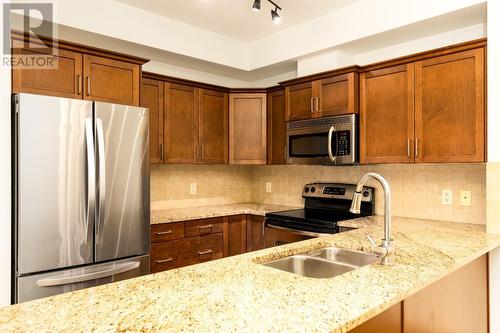 2142 Vasile Road Road Unit# 313, Kelowna, BC - Indoor Photo Showing Kitchen With Stainless Steel Kitchen With Double Sink With Upgraded Kitchen