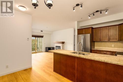 2142 Vasile Road Road Unit# 313, Kelowna, BC - Indoor Photo Showing Kitchen With Double Sink