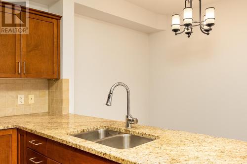 2142 Vasile Road Road Unit# 313, Kelowna, BC - Indoor Photo Showing Kitchen With Double Sink