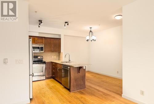 2142 Vasile Road Road Unit# 313, Kelowna, BC - Indoor Photo Showing Kitchen With Stainless Steel Kitchen