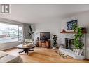 1347 Springfield Road, Kelowna, BC  - Indoor Photo Showing Living Room With Fireplace 