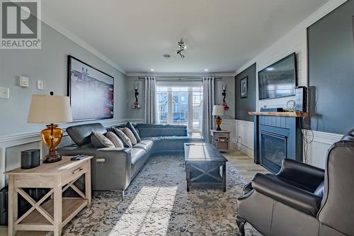 31 Brad Gushue Crescent, St. John'S, NL - Indoor Photo Showing Living Room With Fireplace