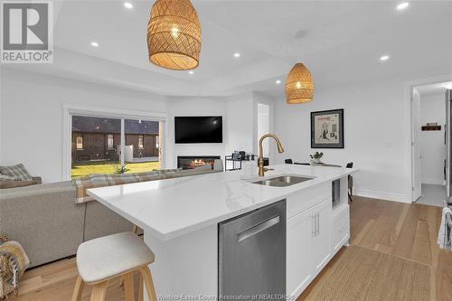 433 Brunmar Crescent, Lakeshore, ON - Indoor Photo Showing Kitchen With Fireplace