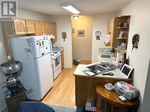 3426 Hemlock Street Unit# 102, Penticton, BC - Indoor Photo Showing Kitchen With Double Sink