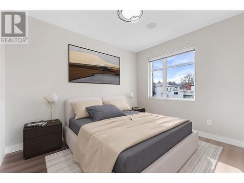 digitally staged - 832 Martin Avenue Unit# 4, Kelowna, BC - Indoor Photo Showing Bedroom