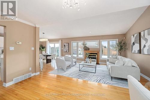 3008 Meadowgate Boulevard, London, ON - Indoor Photo Showing Living Room With Fireplace