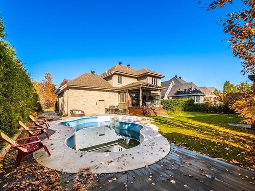 Backyard - 156 Rue Jean-De Fonblanche, Carignan, QC - Outdoor With In Ground Pool With Backyard