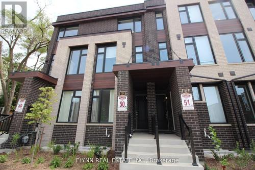 2 - 33 Creekbank (Upper) Road, Toronto, ON - Outdoor With Facade