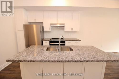 2 - 33 Creekbank (Upper) Road, Toronto, ON - Indoor Photo Showing Kitchen With Stainless Steel Kitchen With Double Sink With Upgraded Kitchen