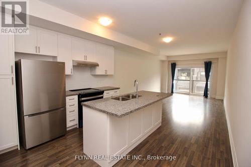 2 - 33 Creekbank (Upper) Road, Toronto, ON - Indoor Photo Showing Kitchen With Stainless Steel Kitchen With Double Sink