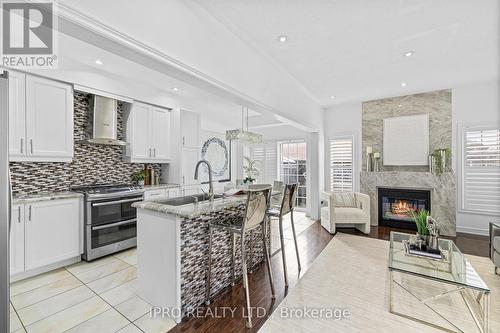 97 Gentile Circle, Vaughan, ON - Indoor Photo Showing Kitchen With Fireplace With Upgraded Kitchen